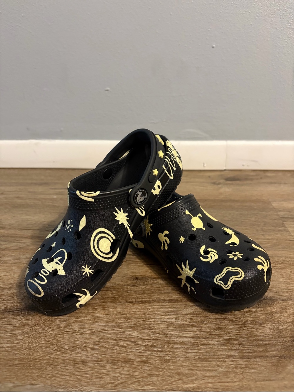 CROCS Kids Black Clogs with Yellow Space Print